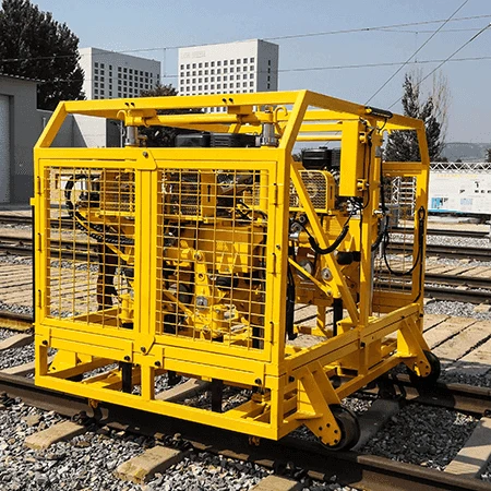 railway ballast tamping machine closeup